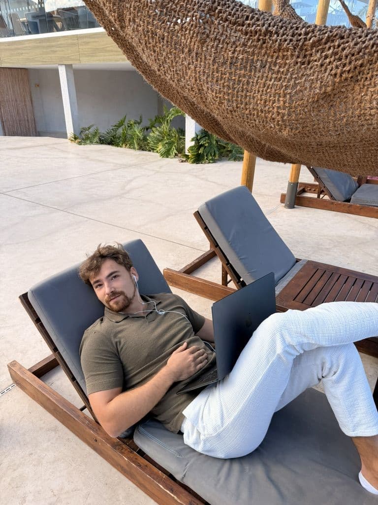 Working from a sun lounger by the pool