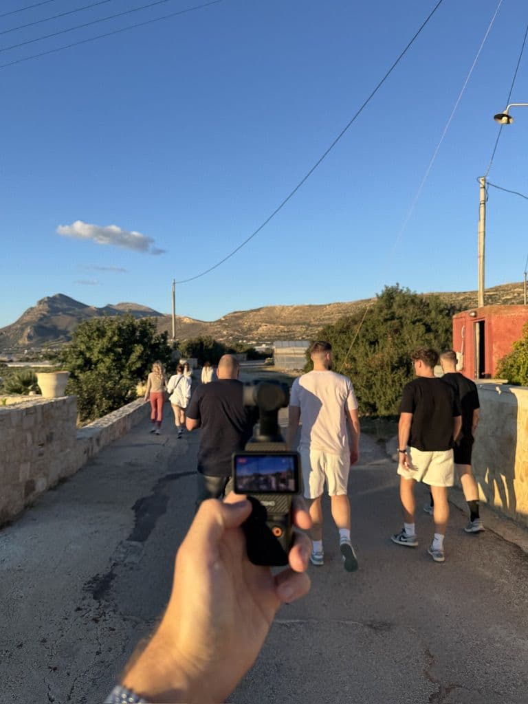The team walking through a village on the Crete workation